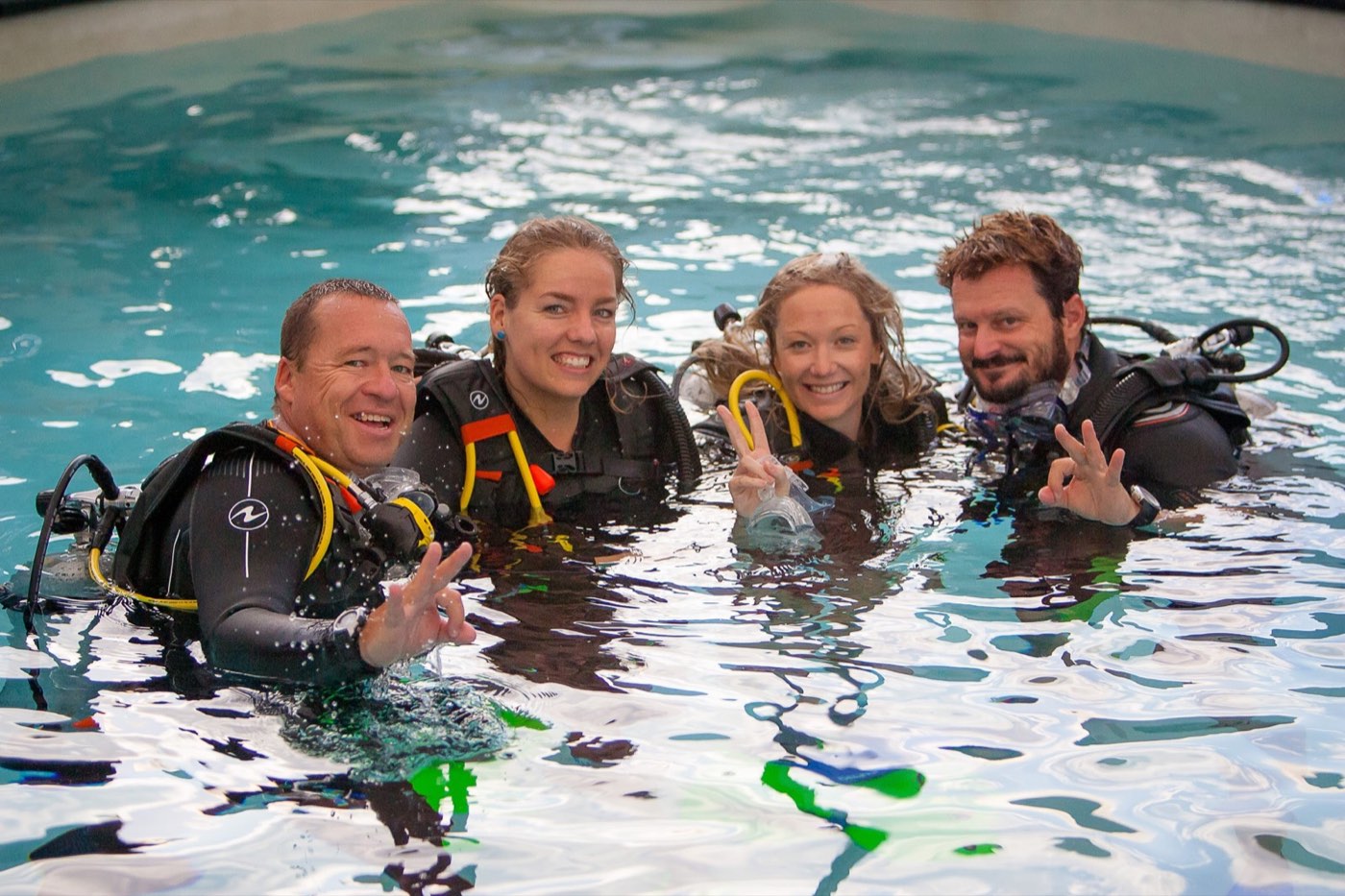 A group of students training in the pool