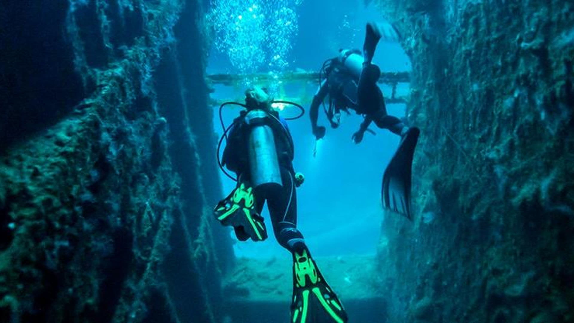 Two divers inside a wreck, Espiritu Santo